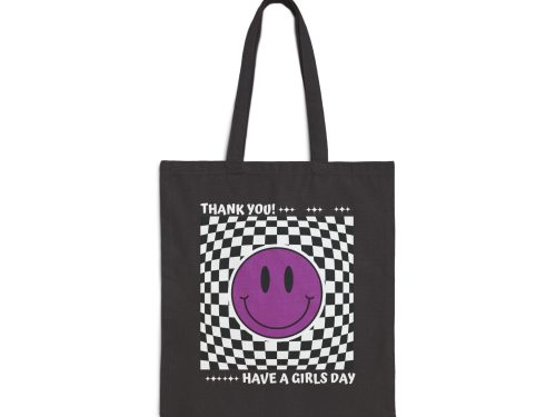 Black canvas tote bag with purple smiley face and checkered "Thank You! Have a Girls Day" graphic - front view